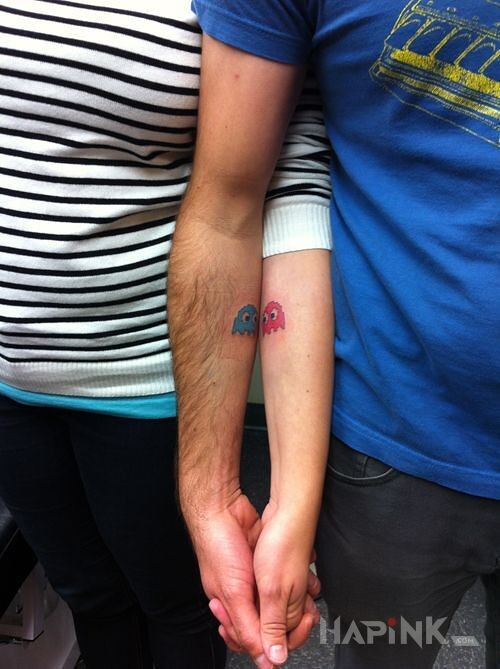 Tattoo Duszki z Pacmana in Love motif on the forearm