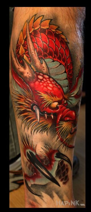 Tattoo Smok in dragons motif and japanese / irezumi style on the forearm