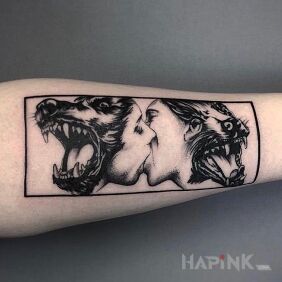 Tattoo Kiss on the forearm motif: black and gray style: graphic / illustrative