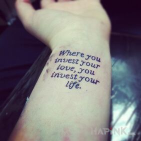 Tattoo A good investment on the wrist motif: lettering style: calligraphy