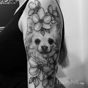 Tattoo Dog / Flowers on the upper arm motif: animals style: graphic / illustrative