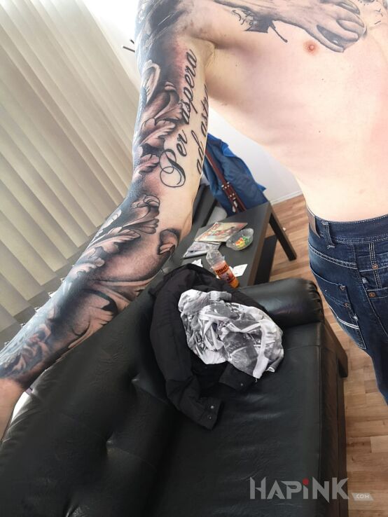 Tattoo Rękaw z napisem in black and gray motif on the forearm