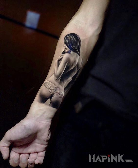 Tattoo Akt in characters motif and realistic style on the forearm