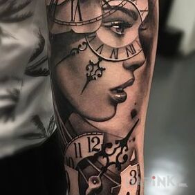 Tattoo The clock on the eye on the forearm motif: objects style: realistic