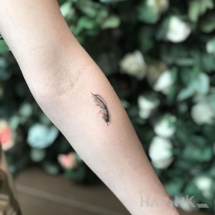 Tattoo Piorko in other motif and minimalistic style on the forearm