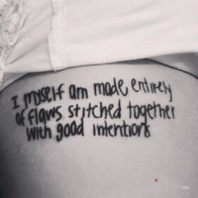 Tattoo Made of flaws on the ribs motif: lettering style: calligraphy