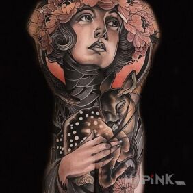 Tattoo In a crown of flowers on the shoulder blades motif: colorful style: neo-traditional
