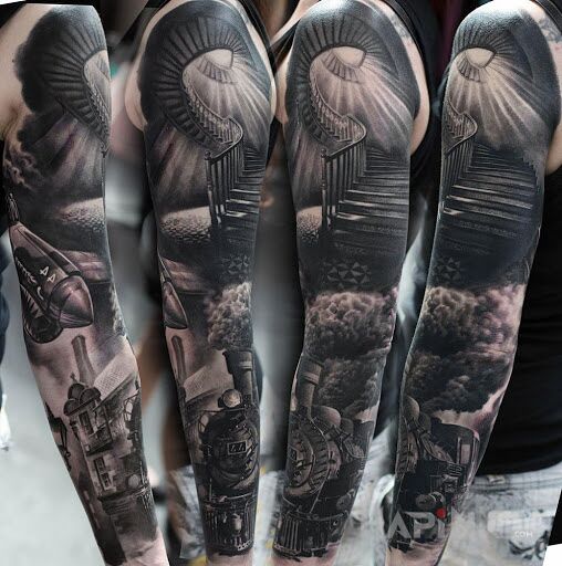 Tattoo Boskie schody in black and gray motif and realistic style on the upper arm