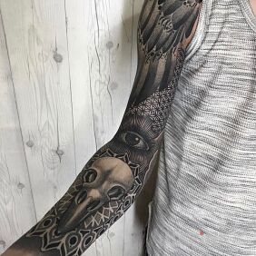 Tattoo Dotwork and graphic style on the forearm motif: black and gray style: dotwork