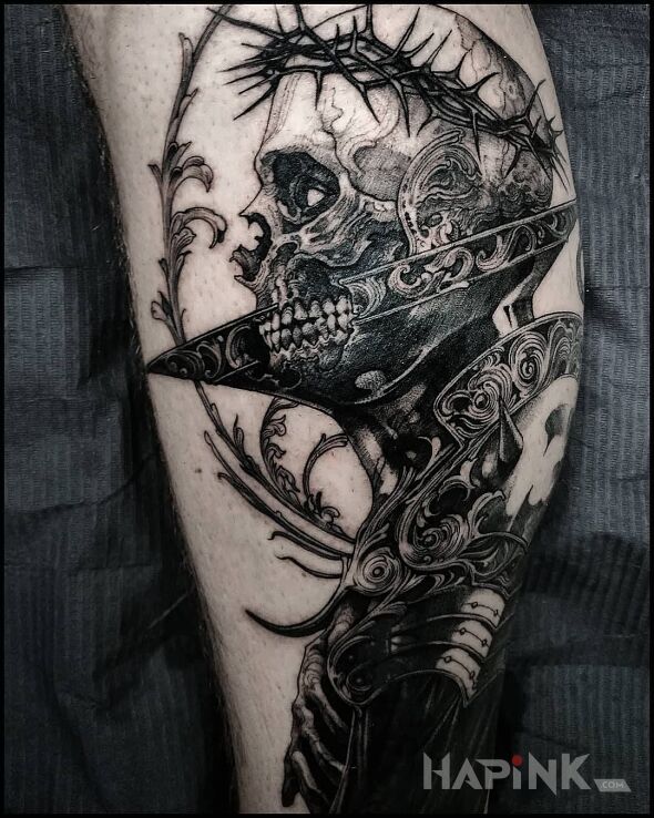 Tattoo Grafika in black and gray motif and graphic / illustrative style on the calf