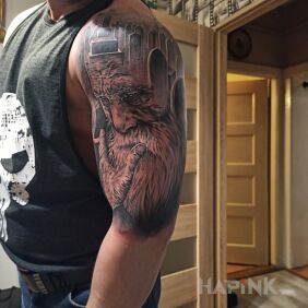 Tattoo Tatoo on the upper arm motif: faces style: realistic
