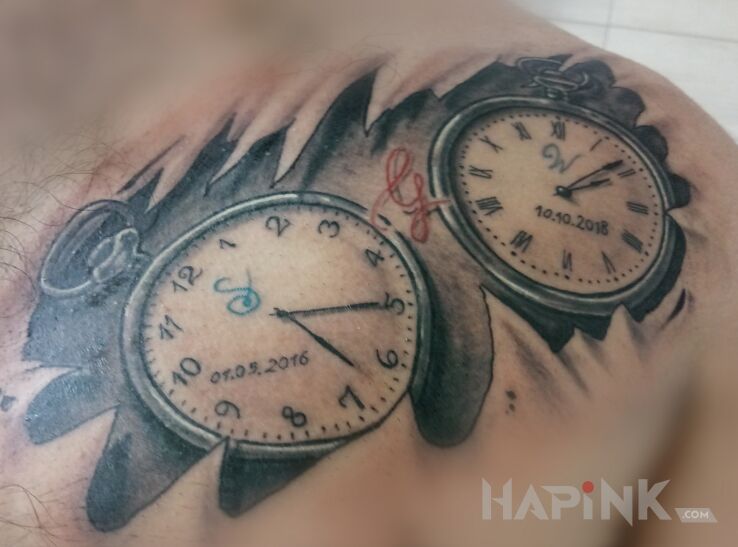 Tattoo Zegary in black and gray motif and realistic style on the chest