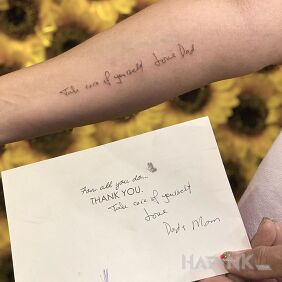 Tattoo Message from Dad on the forearm motif: lettering style: calligraphy