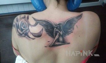 Tattoo Anioł in characters motif on the back