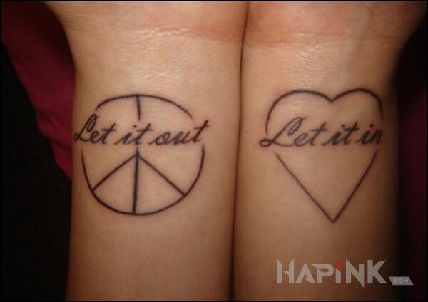 Tattoo Pokoj i milosc in other motif on the wrist