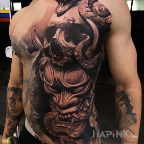 Tattoo Japanese demon on the ribs motif: animals style: realistic