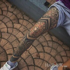 Tattoo Geometric shapes on the leg motif: legsleeves style: blackwork / blackout