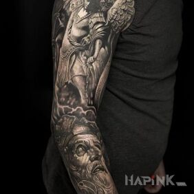 Tattoo Archangel on the upper arm motif: Stained glass style: realistic