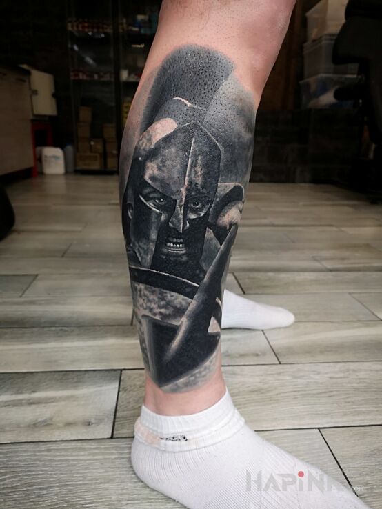 Tattoo Sparta 300? in characters motif and realistic style on the calf