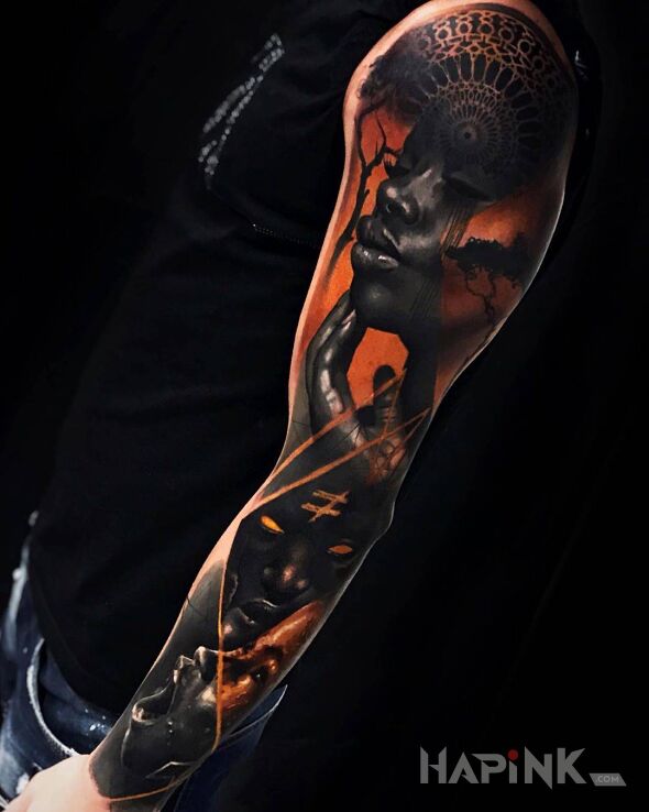 Tattoo Afrika in colorful motif and realistic style on the upper arm