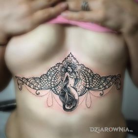 Tatuaż Syrena w ornamentach na brzuchu motyw: ornamenty styl: graficzne / ilustracyjne