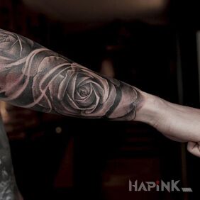 Tattoo Roses on the forearm motif: flowers