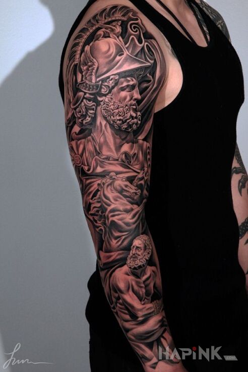 Tattoo Grecki sznyt in sleeves motif on the upper arm
