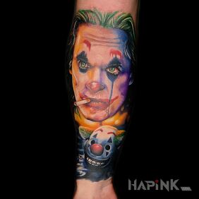 Tattoo Joker on the forearm in colors. Shtos from Dr. Janko on the forearm motif: characters style: realistic