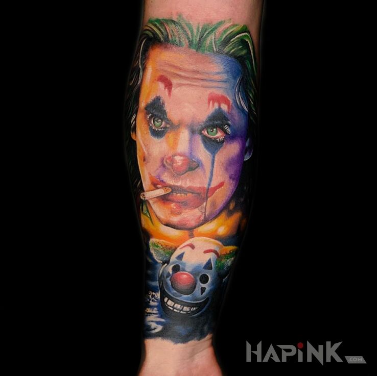 Tattoo Joker na przedramieniu w kolorach. Sztos od Dr Janko in faces motif and realistic style on the forearm