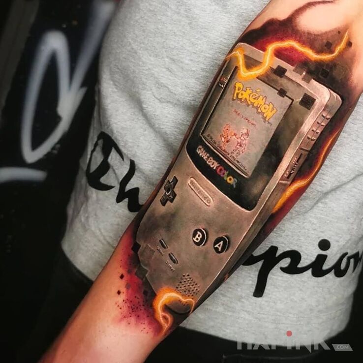 Tattoo Game boy :D in objects motif and realistic style on the forearm