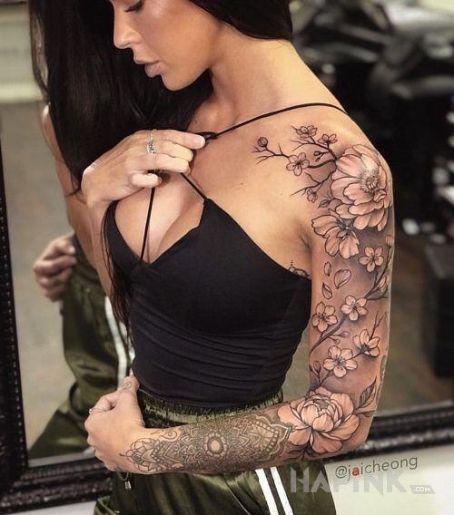 Tattoo Piwonie i kwiaty wiśni in black and gray motif and graphic / illustrative style on the upper arm