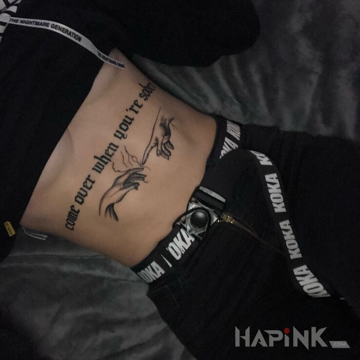 Tattoo Dawaj na trzeźwo in black and gray motif and calligraphy style on the stomach