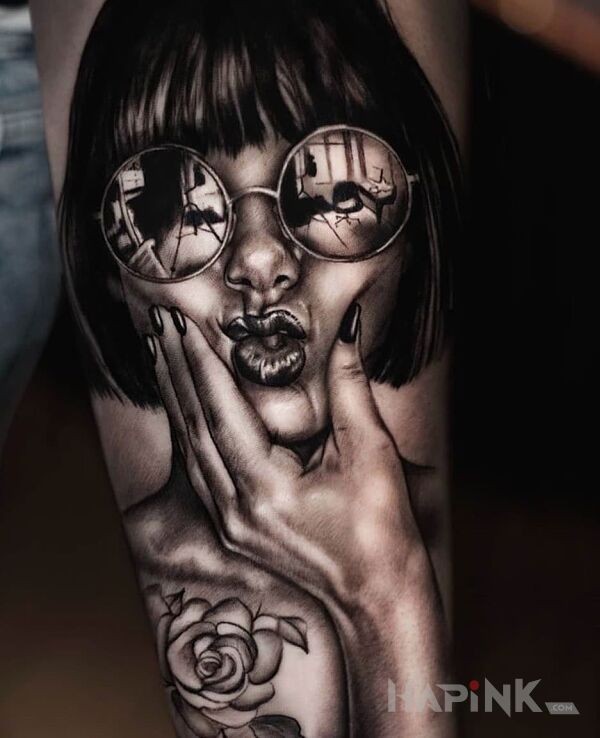 Tattoo Dziewczyna in black and gray motif and realistic style on the forearm