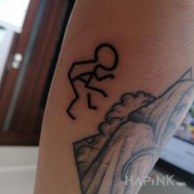 Tattoo Stickman wrestler on the forearm motif: other style: minimalistic