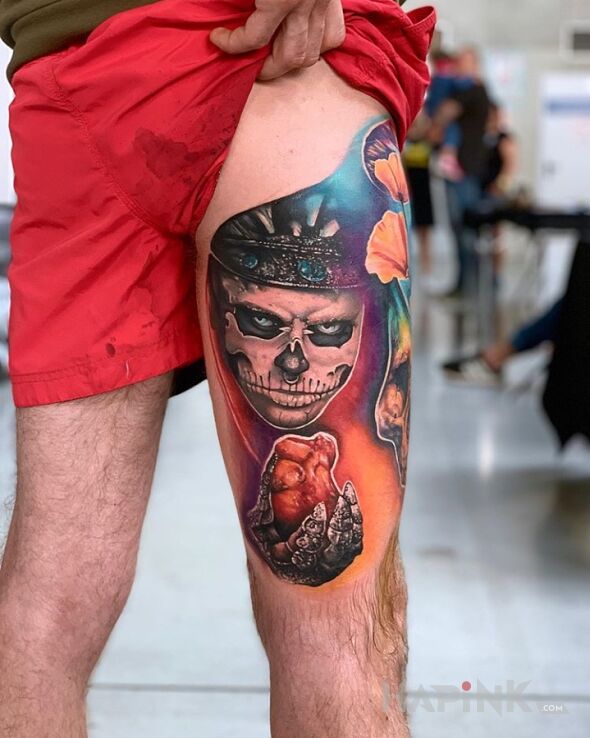 Tattoo Zombie Boy in santa muerte motif and realistic style on the leg
