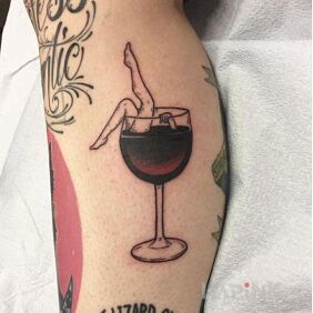 Tattoo Dipped in a glass on the calf motif: other style: graphic / illustrative