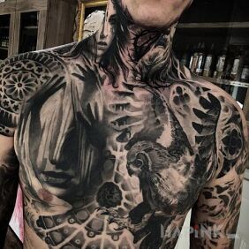 Tattoo Master tattoos on the chest motif: animals style: realistic