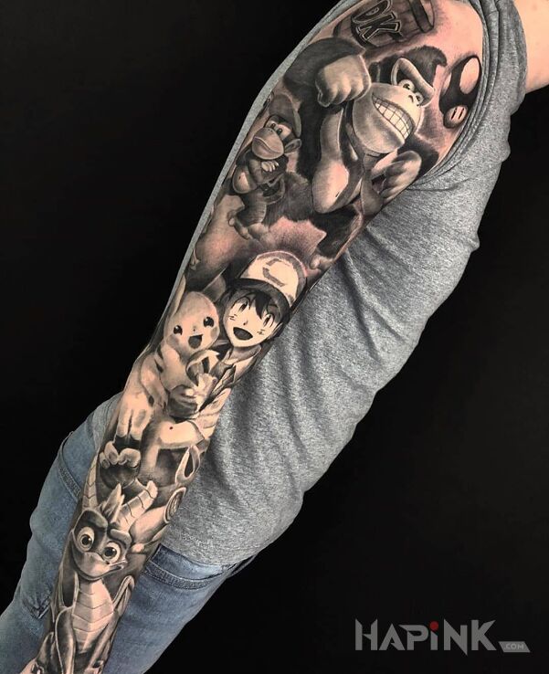 Tattoo Postaci z gier wideo in dragons motif and cartoon / comic book style on the upper arm
