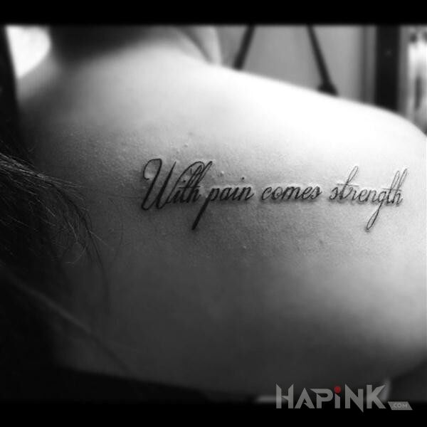 Tattoo With pain come strength in lettering motif on the shoulder blades