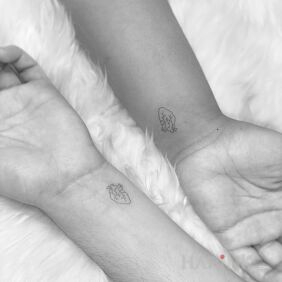 Tattoo Two little hearts on the wrist motif: anatomical style: minimalistic