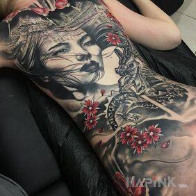 Tattoo Japanese girl on the shoulder blades motif: flowers style: realistic