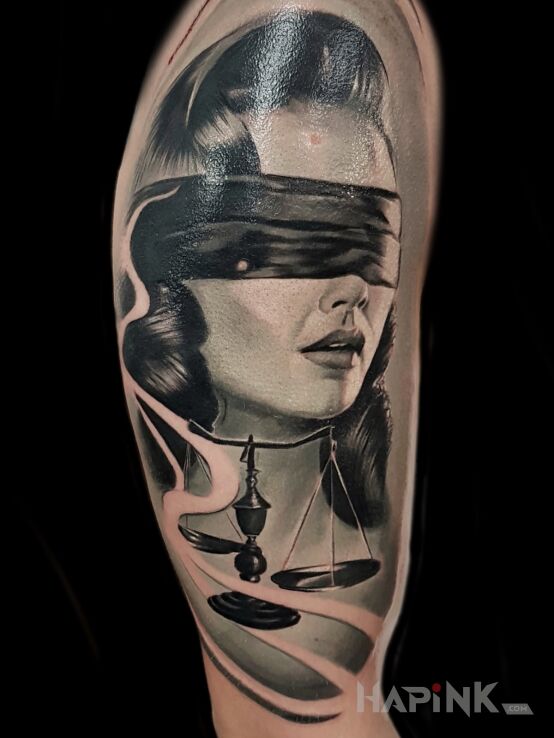 Tattoo Temida in 3D motif and realistic style on the upper arm