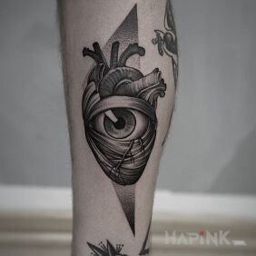 Tattoo Have a heart and look in the heart on the calf motif: black and gray style: dotwork