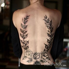Tattoo Wreath on the back motif: flowers style: graphic / illustrative