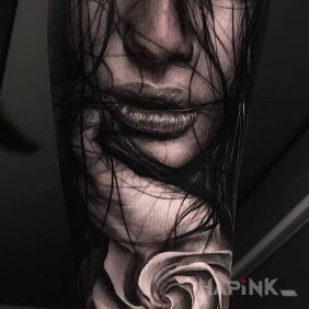 Tattoo Facial hair on the forearm motif: black and gray style: realistic