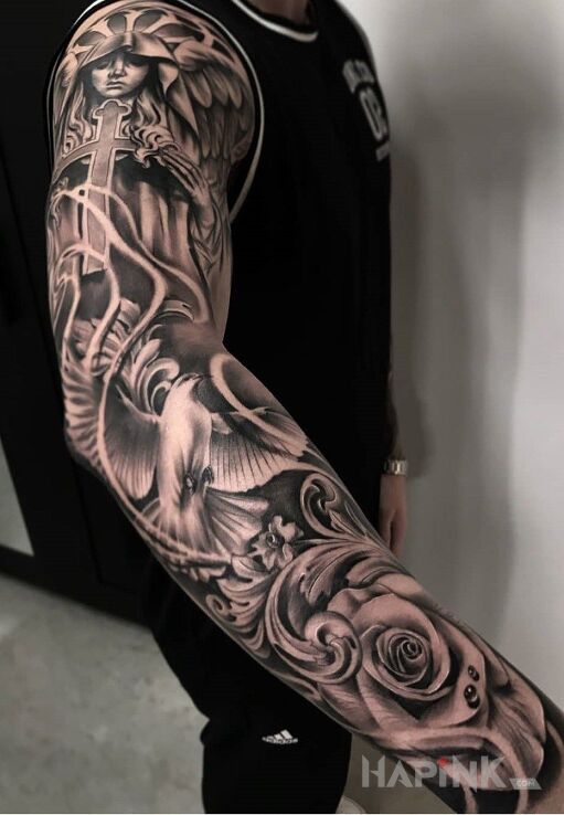 Tattoo Gołąb znakiem pokoju in sleeves motif and realistic style on the upper arm