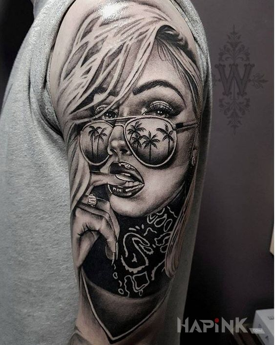 Tattoo Taki portrecik in faces motif and realistic style on the upper arm