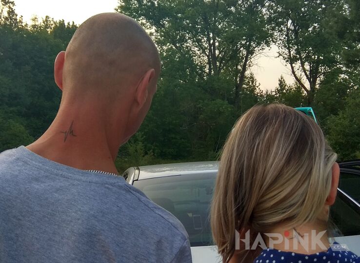 Tattoo "Obrączki" in Love motif and minimalistic style on the nape