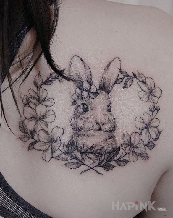 Tattoo Królik in animals motif on the shoulder blades