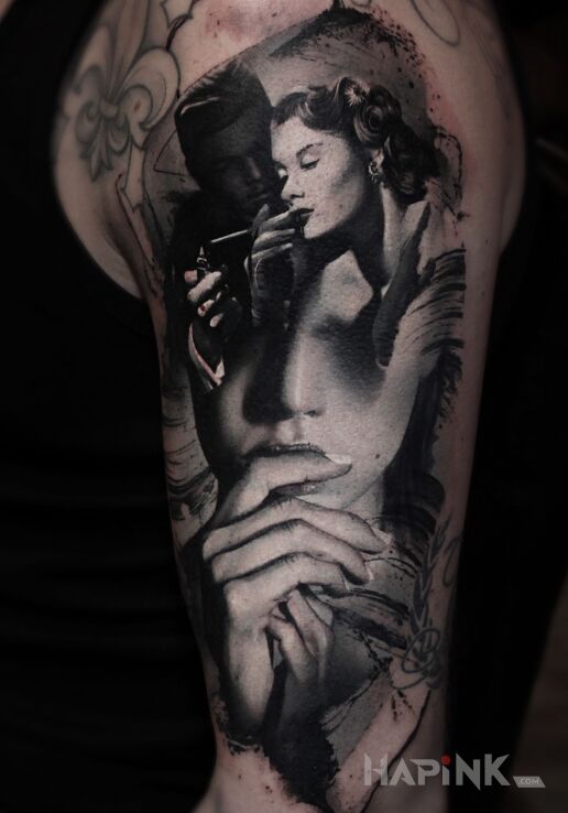 Tattoo Taki laczony portret in characters motif and realistic style on the upper arm